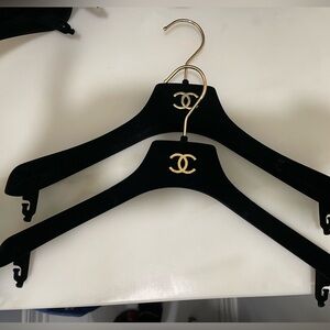 CHANEL Black Hangers with Gold Emblem